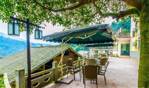 Лешан: Emeishan Sanyuan Shuzhuang Home Stay