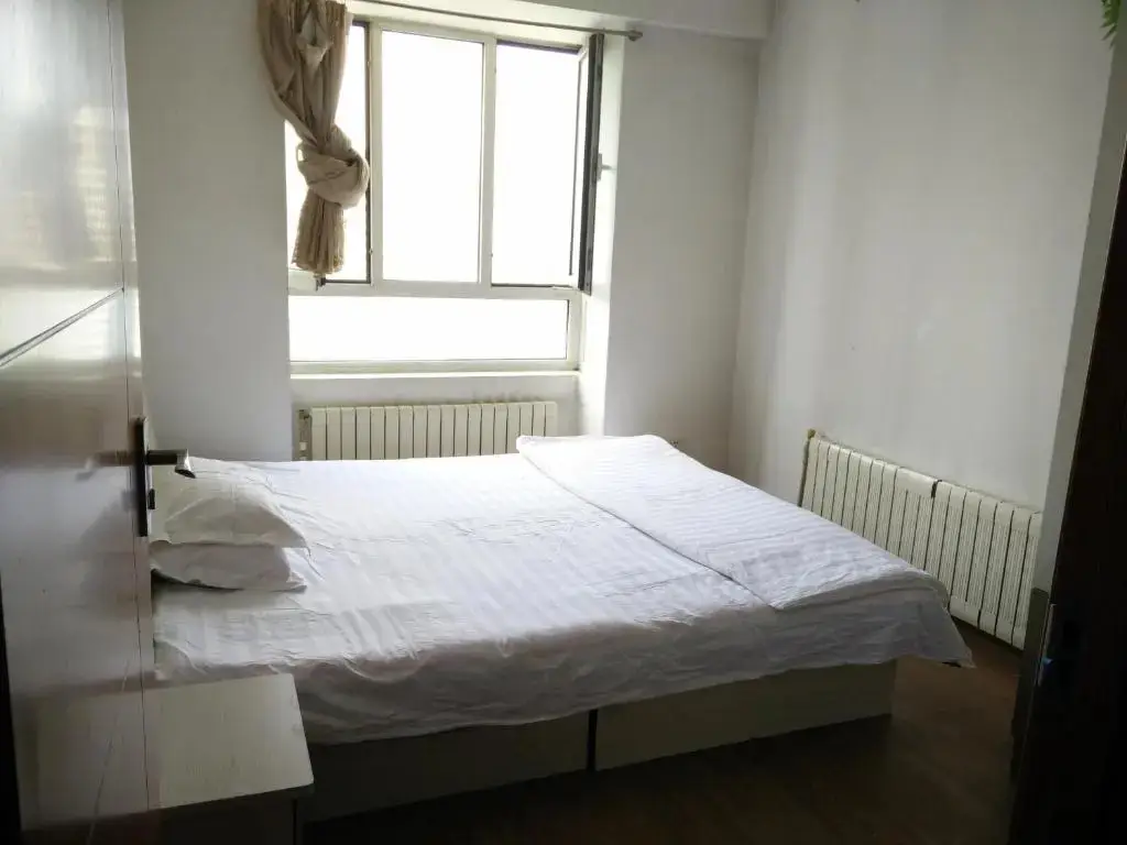 Далянь: Dalian Baofayueju Apartment