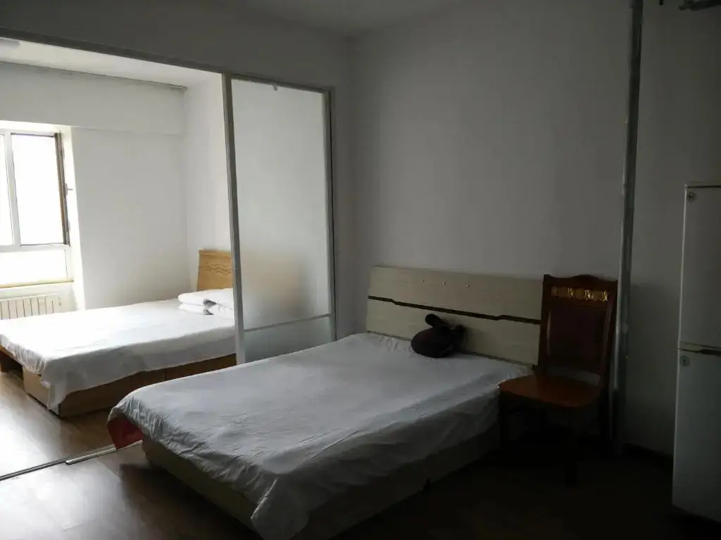 Далянь: Dalian Baofayueju Apartment