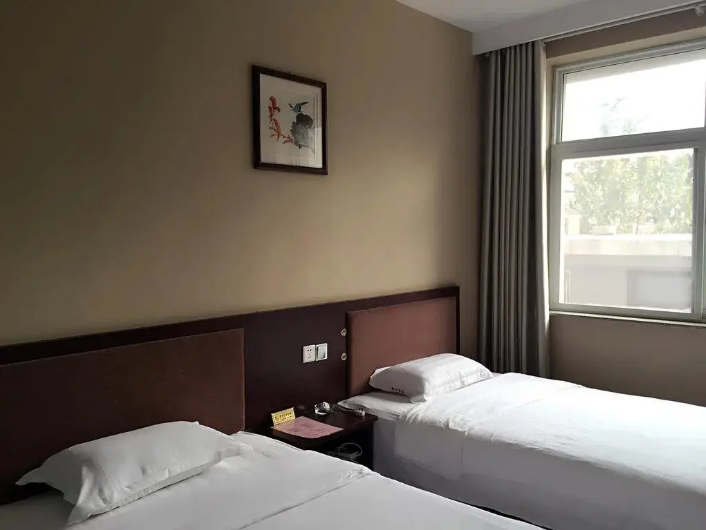 Цзаочжуан: Mingju Business Hotel