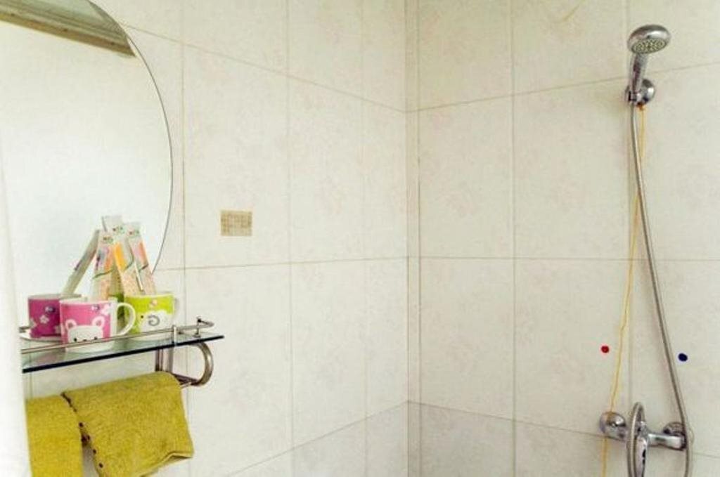 Таншань: Huatian Express Inn