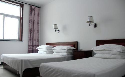 Баодин: Xinyu Guest House