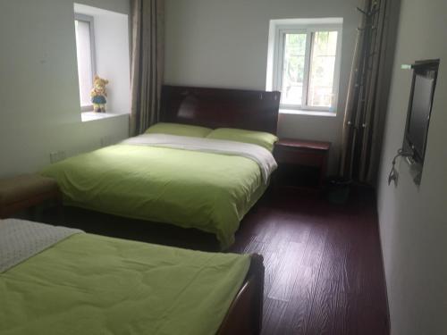 Цзюцзян: Sunshine Homestay