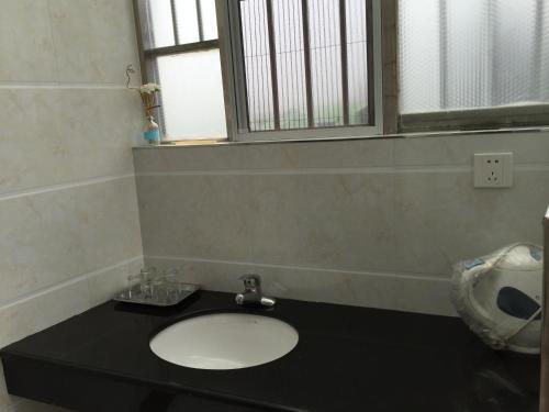 Цзюцзян: Sunshine Homestay