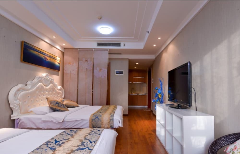 Далянь: Dalian Yijia Apartment Peace Square