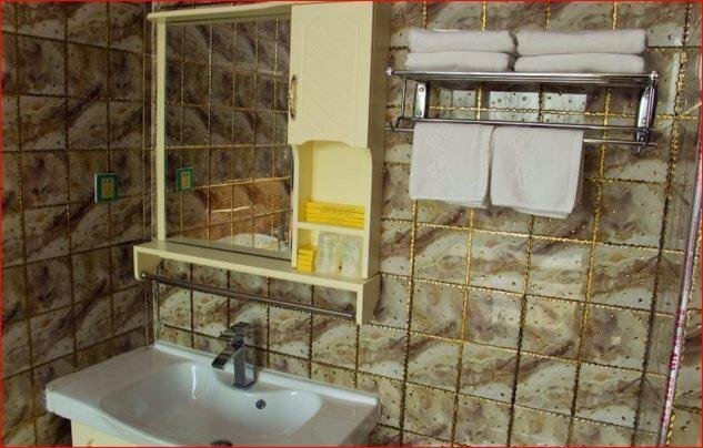 Таншань: Qijia Inn