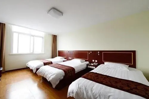 Циндао: Qingdao Xinshijia Business Hotel