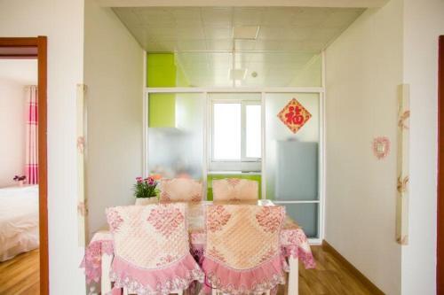 Циндао: Qingdao Golden Beach Ramble Beach Holiday Apartment
