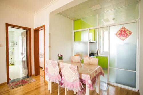 Циндао: Qingdao Golden Beach Ramble Beach Holiday Apartment