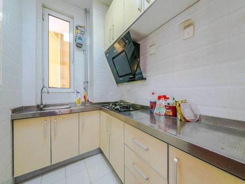 Циндао: Qingdao Golden Beach Ramble Beach Holiday Apartment