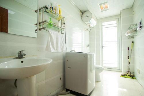 Циндао: Qingdao Golden Beach Ramble Beach Holiday Apartment
