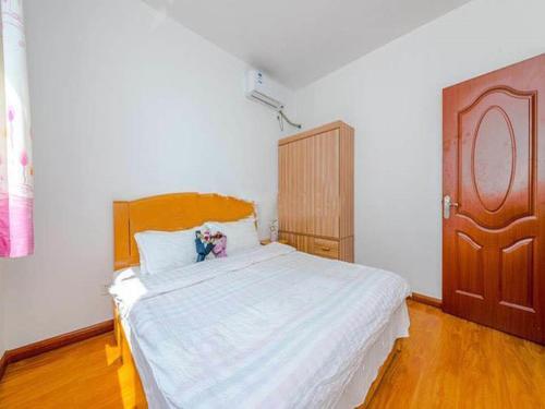 Циндао: Qingdao Golden Beach Ramble Beach Holiday Apartment