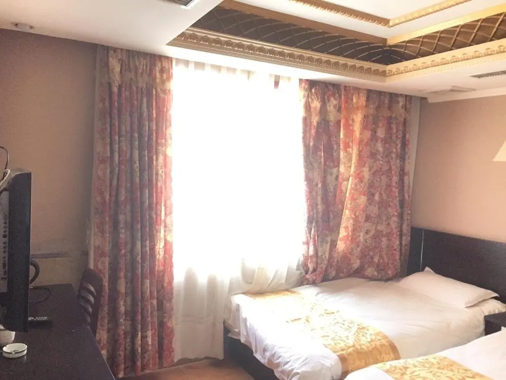 Циндао: Qingdao Huangjia Garden Business Hotel