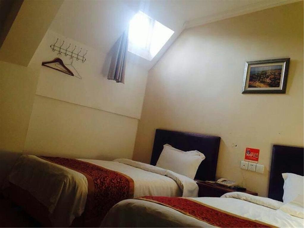 Циндао: Qingdao Xilaike Business Hotel