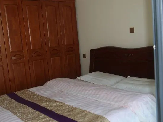 Циндао: Jinshatan Holiday Apartment