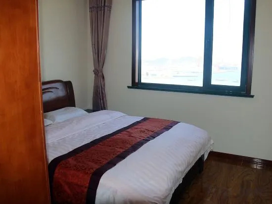 Циндао: Jinshatan Holiday Apartment