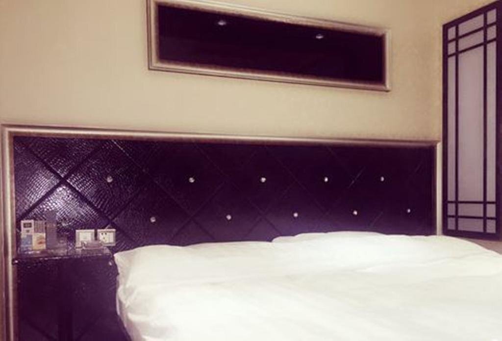 Фушунь: Aichao Holiday Inn