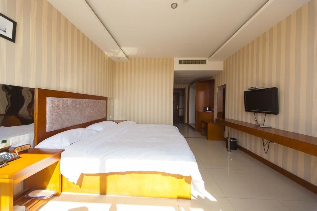 Даньдун: Huiyuan Holiday Hotel
