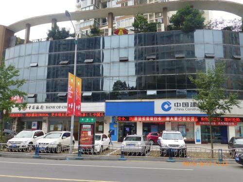 Лешан: Leshan Seven Days Sunshine Student Apartment