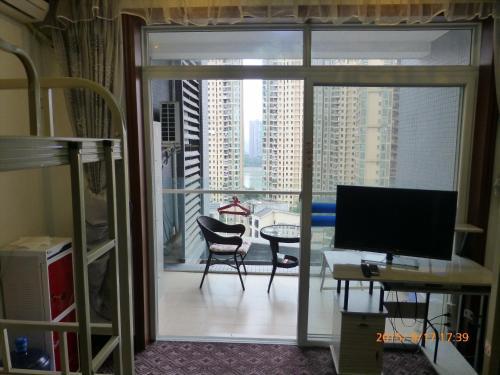 Лешан: Leshan Seven Days Sunshine Student Apartment