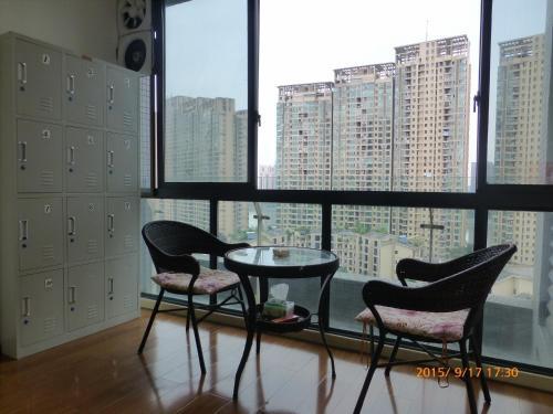 Лешан: Leshan Seven Days Sunshine Student Apartment