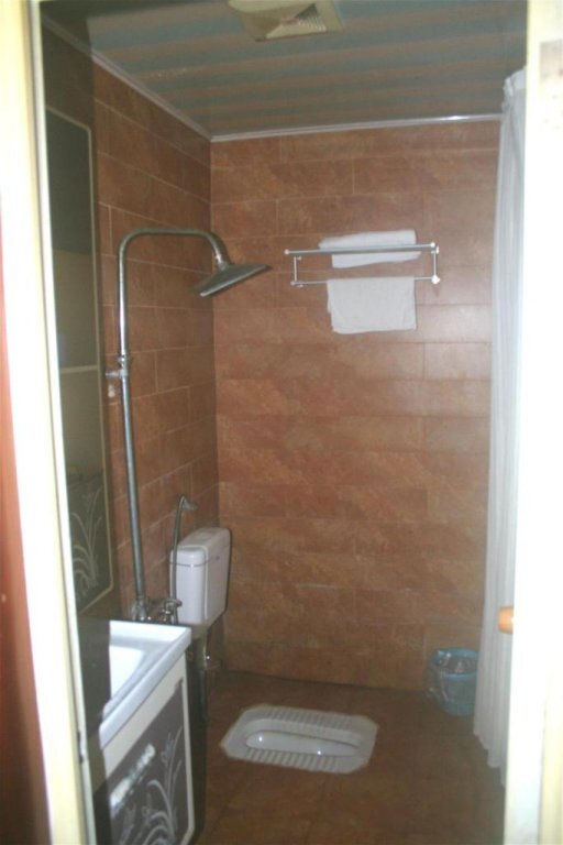 Яань: Hongming Business Hotel