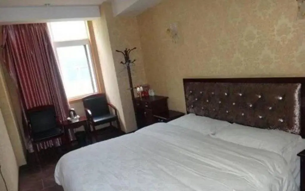 Мяньян: An County Zhengxing Business Hotel