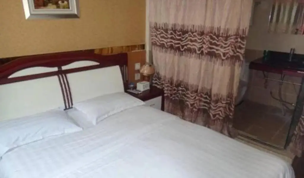 Мяньян: An County Zhengxing Business Hotel