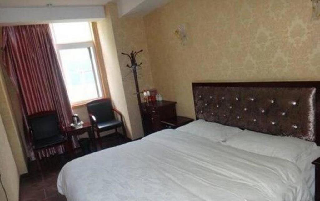 Мяньян: An County Zhengxing Business Hotel