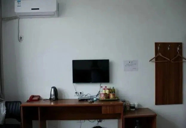 Лиаоченг: Xianghua Express Inn