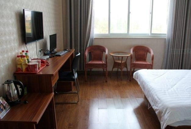 Лиаоченг: Xianghua Express Inn
