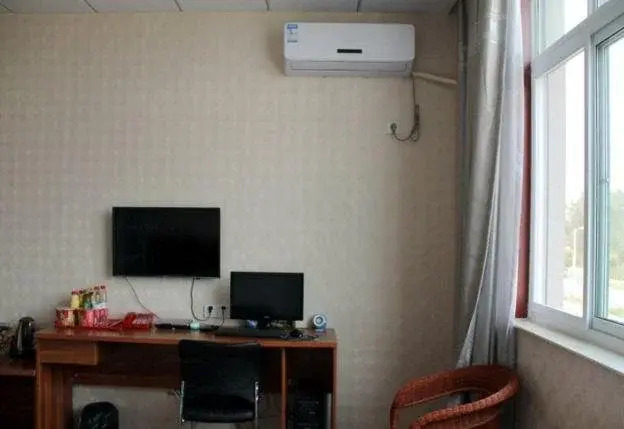 Лиаоченг: Xianghua Express Inn