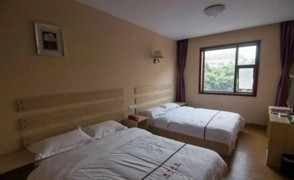 Суйнин: Xinyu Hotel
