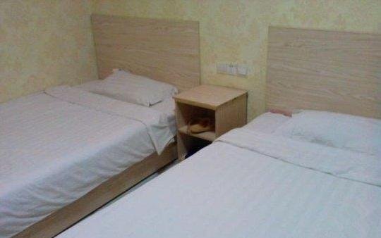 Хецзе: Xinhe Business Hotel