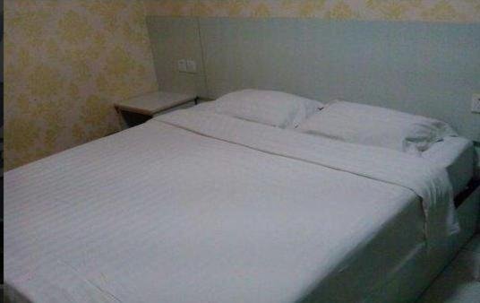 Хецзе: Xinhe Business Hotel