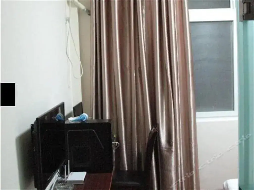 Мяньян: Anxian Longfeng Business Hotel