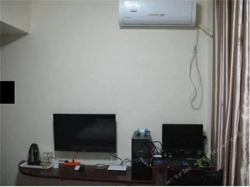 Мяньян: Anxian Longfeng Business Hotel