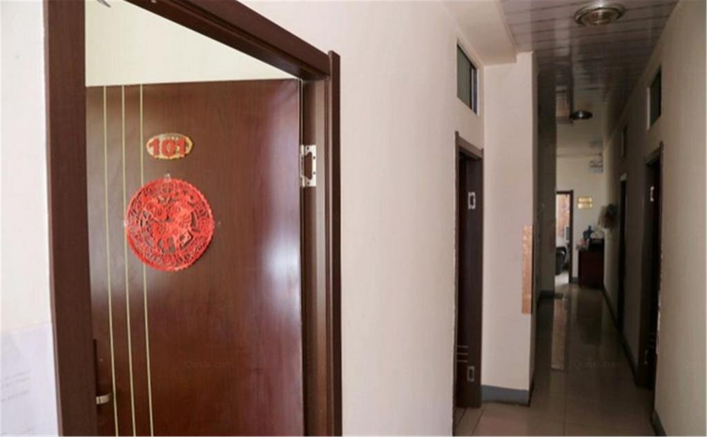 Харбин: Harbin Puyue Inn