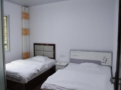 Яань: Ya'an Shimian Old Street Inn