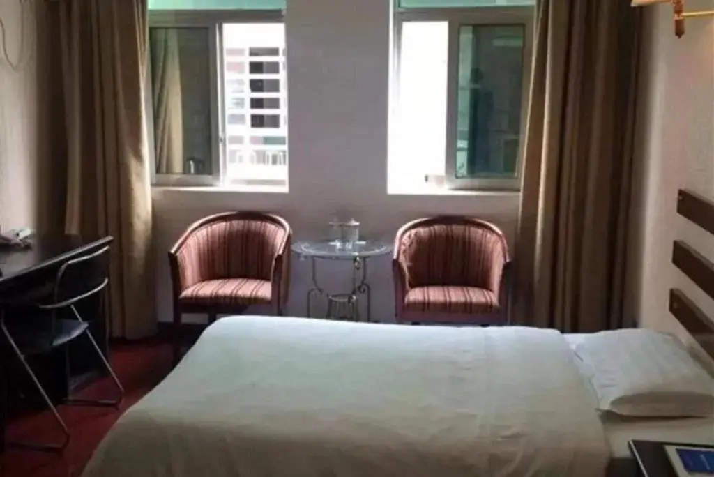 Мяньян: Anxian Tongxin Business Hotel