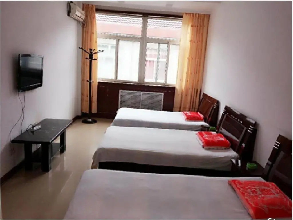 Джинченг: Huangcheng Xiangfu 805 Family Inn