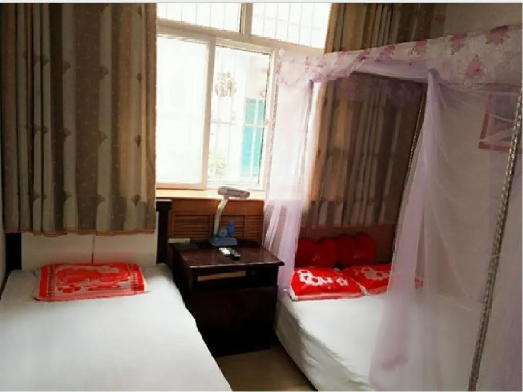 Джинченг: Huangcheng Xiangfu 805 Family Inn