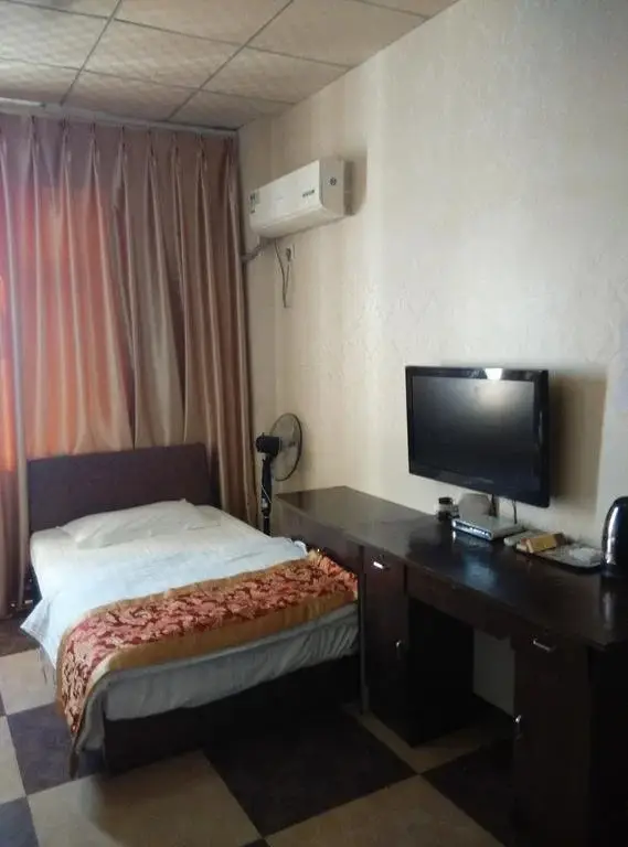 Яань: Yurui Business Hotel