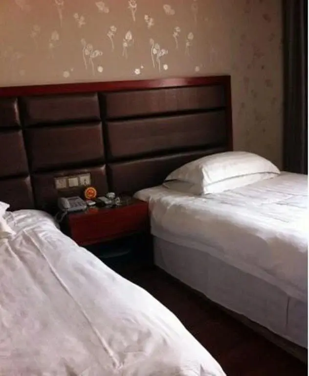 Наньтун: Henglong Business Inn