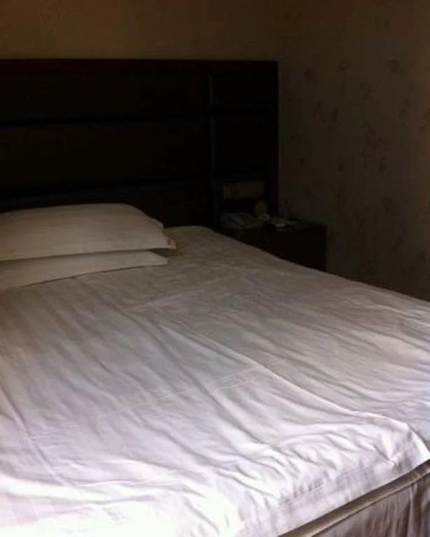 Наньтун: Henglong Business Inn