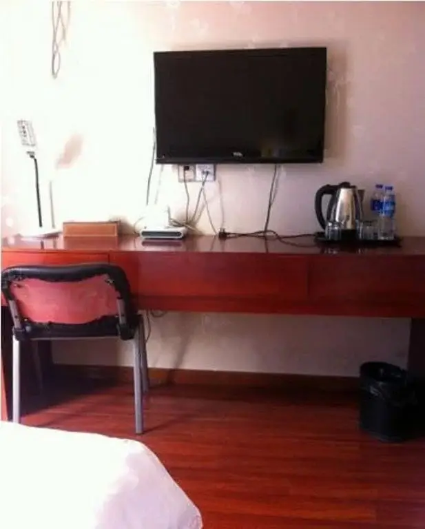 Наньтун: Henglong Business Inn