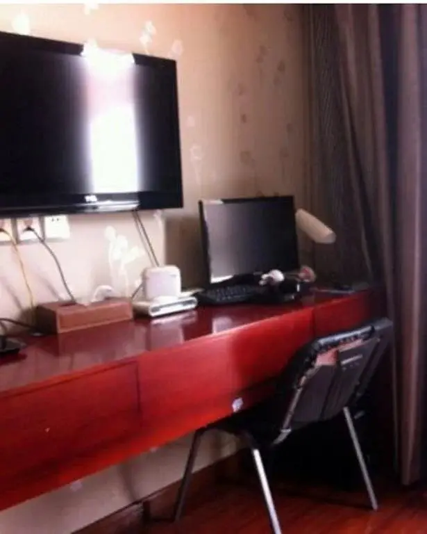 Наньтун: Henglong Business Inn