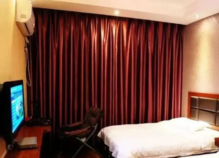 Чжанцзяцзе: Zhangjiajie 1+2 Business Hotel