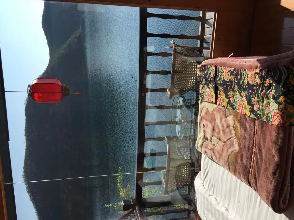 Лицзян: Lu Gu Lake Li Ge Ban Dao Travellers'House