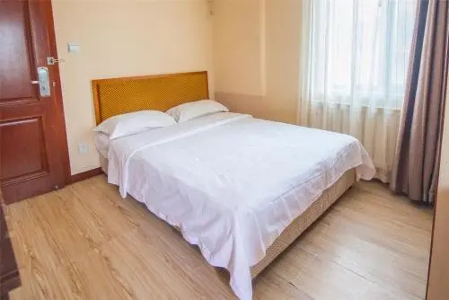 Далянь: Dalian Guohua Apartment